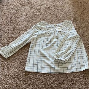 Dressy top blouse. White cream with black grid.
